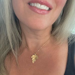 Gold tone Leaf Necklace with Crystal